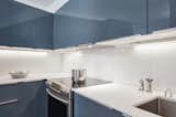 MAS Studio revived the building’s original monochrome kitchens with Ikea cabinetry.