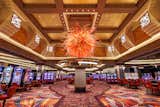 In the Atlantis casino, glass artist Dale Chihuly’s massive <i>Temple of the Sun</i>, one of four sculptures Chihuly created for the property, was my lodestar, guiding me toward Marina Village.