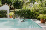 The backyard is perfect for basking in the sun, taking a dip in the pool, or enjoying an alfresco meal. When the season permits, the surrounding trees yield a variety of fruits.
