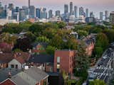 The couple live on the ground floor of the main building and in the two-story laneway house located across a paved terrace. In the future, the laneway house can be turned into a separate apartment, to create a total of five condos.