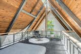 A skylight runs along the apex of the pitched roof.