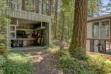 The garage/studio includes an electric vehicle charger.