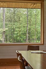 The window frames are crafted from the same Douglas fir as the ceiling and other interior details, minimizing visual distraction and allowing the views to take center stage.&nbsp;