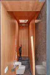 In addition to the en suite bathroom, the apartment also has a powder room for guests.