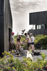 The hands-on experience is meant to give students a sense of how a design translates to its site.  Photo 7 of 23 in This Clever Twist On an A-Frame Cabin? It Started in a Classroom