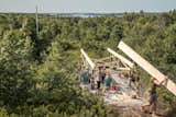 Braithwaite’s students spent the second half of the two-week program framing the design they created together.  Photo 6 of 23 in This Clever Twist On an A-Frame Cabin? It Started in a Classroom