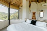 Both towers hold bedrooms on their top levels. The ceilings are the original cypress.