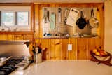 The pegboard allows Chuck to access all of his cooking essentials quickly.&nbsp;
