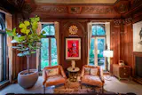The walls are fashioned from carved walnut.