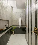 This bathroom is wrapped in Bardiglio marble imported from Tuscany.