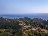 The property is nestled between miles of preserved trail systems for easy nature access.