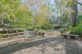 The in-ground pool is located in the generously sized backyard.