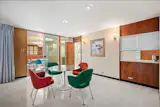 The Roof of This $775K Memphis Midcentury Curves All the Way to the Ground - Photo 6 of 15 - 