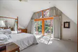 The primary bedroom opens to a private outdoor deck.