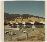 The building and its adjacent warehouse were designed by John Savage Bolles in the 1960s.