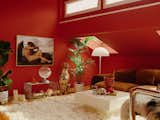 Charly started by painting a single red wall. Then he added a second, and a third, until the entire living room was crisp and crimson.