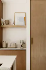 Details of the kitchen cabinets, with Hisense appliances that Facundo purchased in Australia.