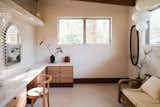 Of the home’s bedrooms is set up as a flex space with a large built-in vanity.