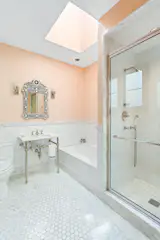 The third-floor bedrooms share a skylit bathroom.