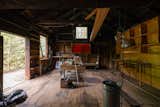 An accessory building near the main house can serve as an artists studio or workshop.