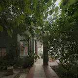 Marcos Altgelt, cofounder of Argentine design studio Ries and one of last year’s Dwell 24, renovated a 100-year-old “chorizo house” in Buenos Aires in exchange for a decade of reasonable rent. Chorizos—so called because their rooms are arranged in a row, like sausage links—feature long, greenery-filled courtyards with doors offering independent access to each room.