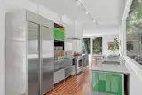 The kitchen is equipped with Wolf and Subzero appliances along with and custom USM cabinetry.