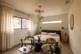 Earth Tones Ground This Minimalist L.A. Midcentury Reno Seeking $1.4M - Photo 9 of 14 - 