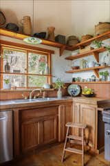 Open shelving displays vintage and antique Japanese pieces.