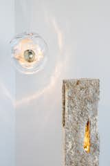 Mycelium—essentially, the building blocks that make mushrooms—is a remarkably versatile and entirely sustainable material that’s picking up some steam in the design world in recent years. Kamilla Csezgi uses the material to stunning effect in her lamps and sculptures, pictured on the right,  by molding the mycelium around bubble wrap to create texture and structure as it grows.