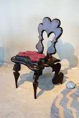 On the other end of the aesthetic spectrum sits Baltimore-based design collective Realm. Their Quelaag chair is part of their Witch’s Chair series; made of dark wood, rabbit and lizard skin, it’s a seat fit for a high-end goth queen.