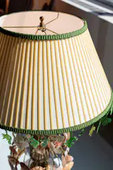 The parsley that dangles from the edge is made of Shrinky Dinks; McCauley said that her original idea of coating parsley in resin would’ve been too heavy. The result is a delightful item that dabbles heavily in the surreal—the answer to McCauley’s question, "What if Fellini were a lamp?"