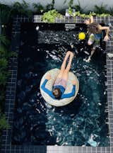 The new black-tiled pool is the perfect place to cool off on hot summer days.