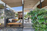 The gardens are planted with citrus, fig, and crab apple trees.