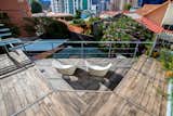 The roof terrace offers city mountains and development in the blossom of the neighborhood.