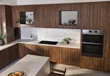 The walnut millwork in the Dacor concept kitchen is a stand-out example of how natural materials can be used to create a warm and welcoming kitchen.  Photo 3 of 9 in How to Ensure Your Kitchen Has Good Flow