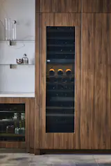 A full-size wine fridge makes a statement in the kitchen, and is ideal for people who regularly entertain. Dacor’s fully integrated, full-sized wine column holds up to 100 bottles of wine in three independently cooled zones.