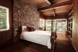 The bedrooms open to balconies overlooking the surrounding nature preserve.
