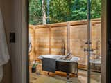 The outdoor bathtub is one of many ways this home makes use of it's stunning natural surroundings.