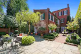 The home is a prime example of D.C.’s federalist architecture, defined in part by the symmetrical redbrick facade.&nbsp;