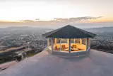 The home is perched atop a mountain, and the top-floor room outlooks the San Bernardino National Forest, Lake Perris, and Lake San Jacinto.