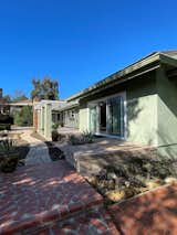 Before: The couple loved the neighborhood and the old oaks on the property. “I knew the house needed to be fixed up,” says Kim. “But I liked the layout and the structure and the fact that it was all on one level.”
