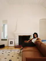 The Outline Sofa is from Muuto, and the area rug is from Morrow Soft Goods.