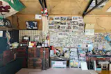 The museum is as much a space for remembrance as it is a community hub, with photos of visitors pinned to a gallery wall.