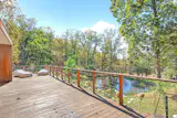 In Woodstock, a Curvy Home With a Far-Out Facade Seeks $3.5M - Photo 8 of 12 - 