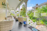 The home’s porch is oriented toward the side garden for privacy.&nbsp;