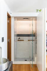 The library upstairs also includes a full bathroom, essentially transforming the upper level to a private space.