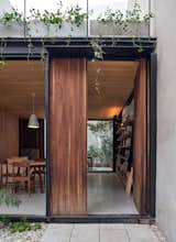 Across the entry courtyard and through a lapacho wood door is the living space, which was constructed using traditional methods.