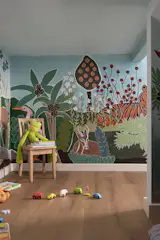 This custom playroom is hidden behind a secret door accessed through a media console and is a cute space for the kids to call their own.