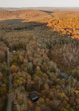 Per the agent, "Powered by 26 monocrystalline solar panels on a 15 k Sol-Ark inverter with a lithium-ion LifePo battery bank, the home generates 38 kWh of electricity daily and stores enough energy for five-seven days off-grid." That said, it can be connected to the grid, if desired.
