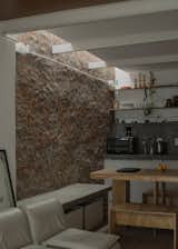 A recessed ceiling brings light into her kitchen and dining area/